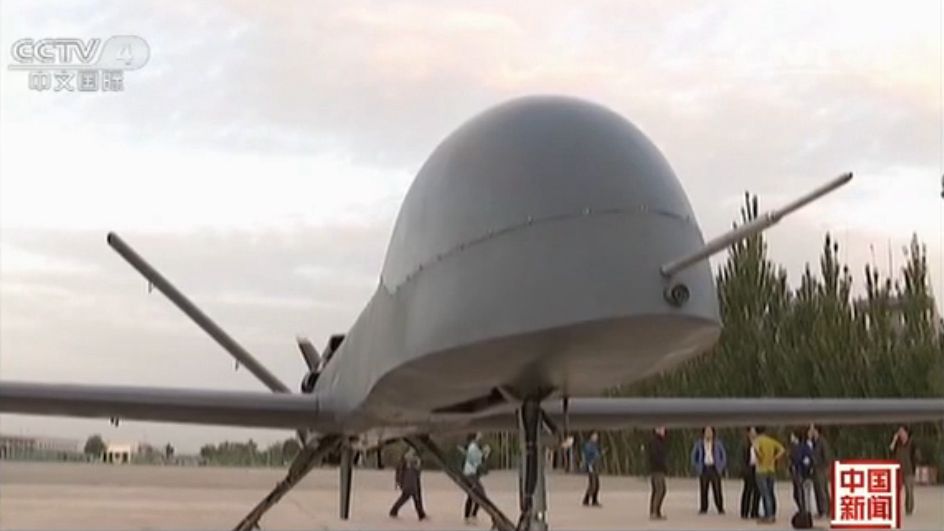 The screen shot from the video of CNTV shows that one of China's biggest UAV (UAV，Unmanned Aerial Vehicle) has completed its maiden flight successfully. (Photo source: CNTV) 