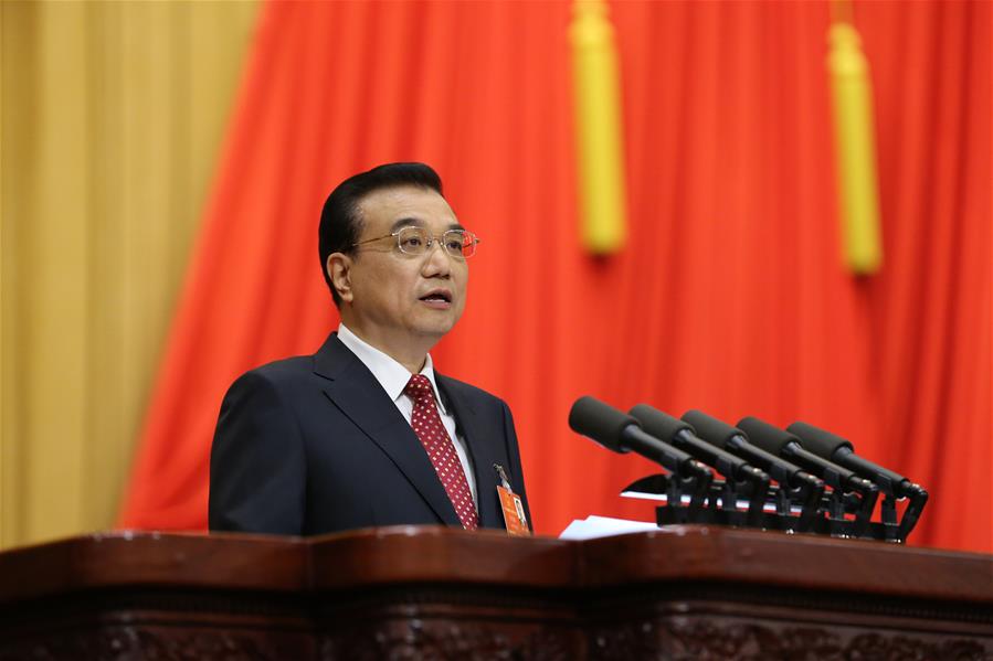 China raises deficit to 3 pct of GDP, cuts taxes across board