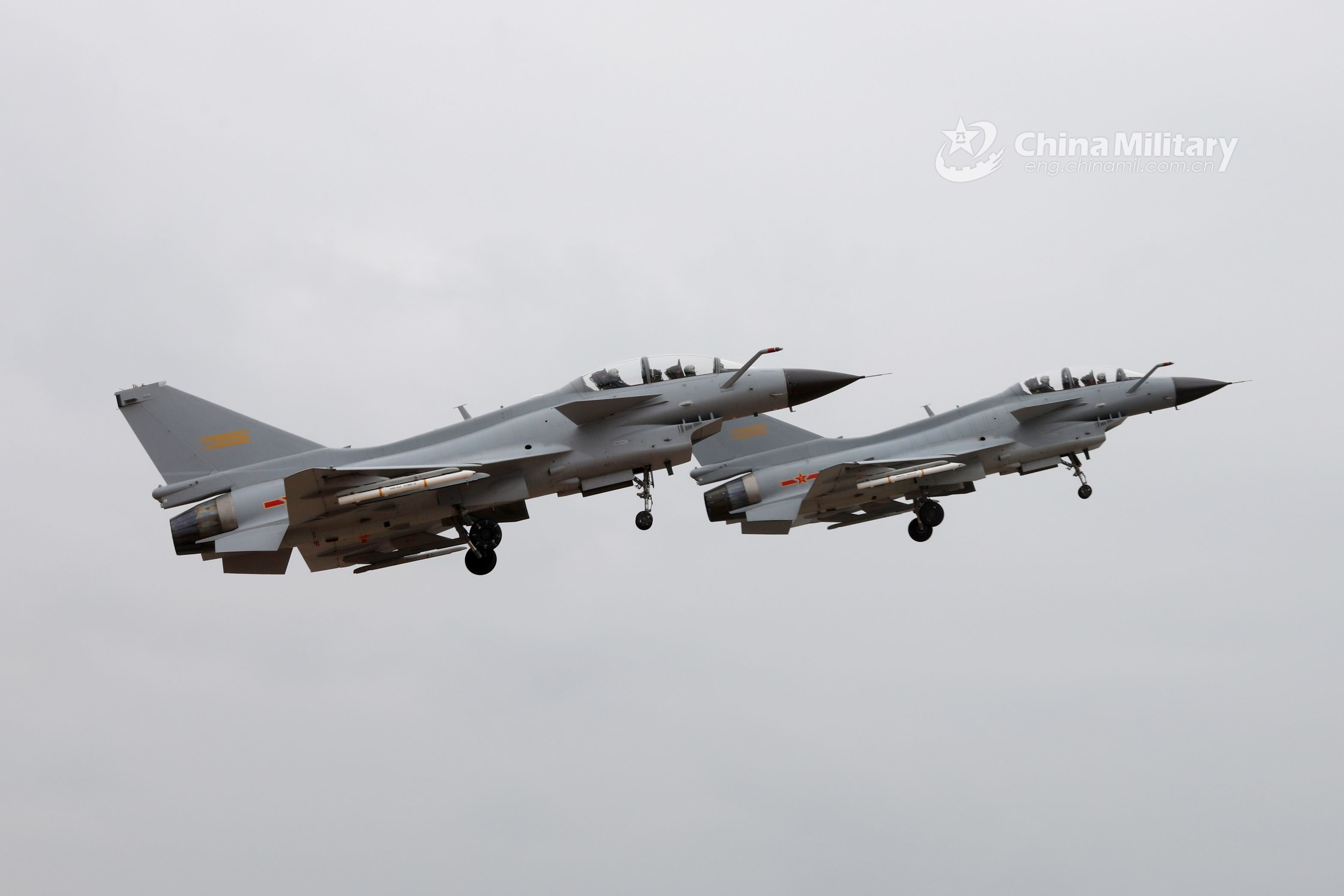 Fighter jets soar to stratosphere above clouds