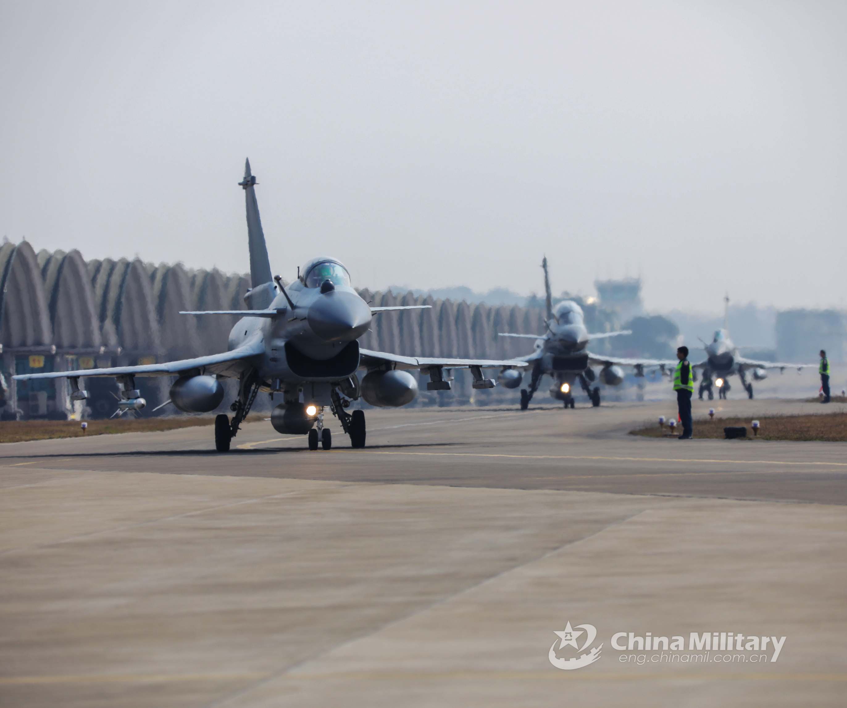 Fighter jets accelerate to take off