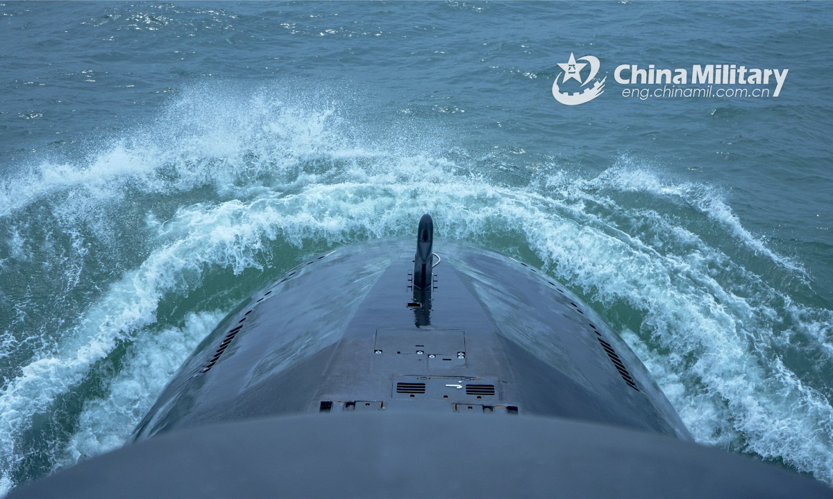 A submarine attached to a submarine flotilla with the navy under the PLA Northern Theater Command bears off a port and heads out for maritime training on May 6, 2022. Photo:China Military